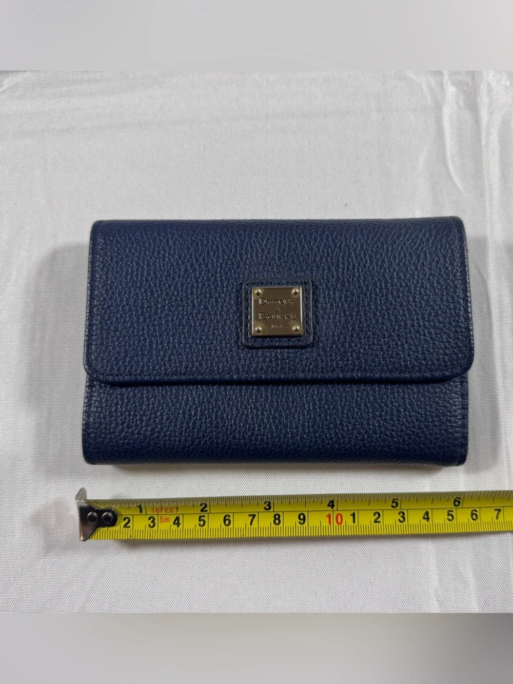 Dooney & Bourke Navy Pebble Leather Wallet with Metal Logo Plaque